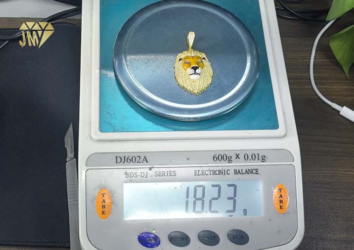 Iced out lion pendant weight